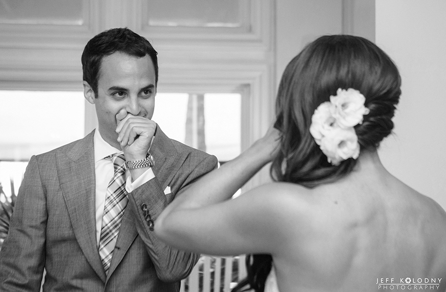 Photo of a grooms face during the first look.